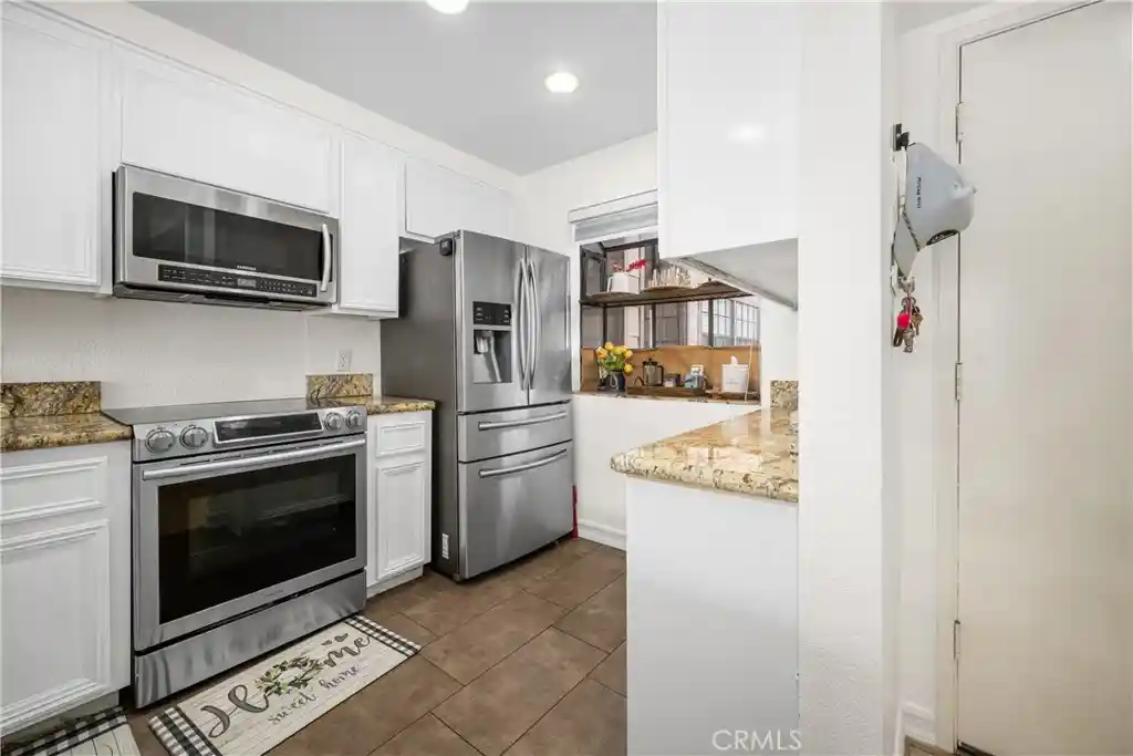 Listing Photo 1 - Condo for sale in 26701 Quail Creek located at 26701 Quail Creek, Laguna Hills, CA 92656 - Unit #206