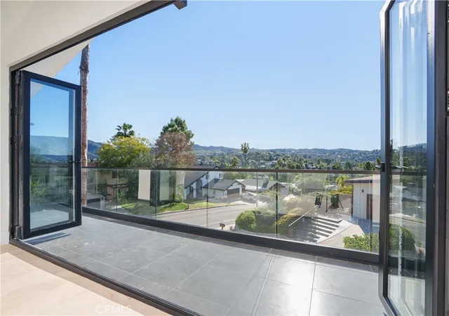 Photo 2 of Single family home for sale at 18827 Edleen Dr, Tarzana, CA 91356 | MLS# SB26045087 | Listing updated on 2026-09-30