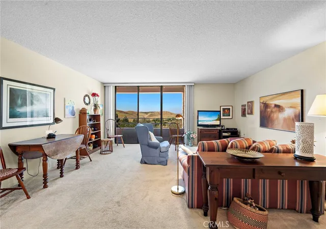 1st image of 24055 Paseo Del Lago #407, Laguna Woods, CA 92637 | MLS# OC26077170