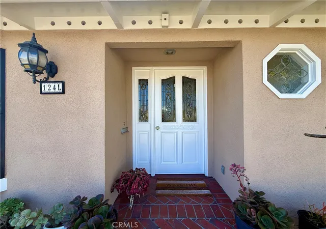 Listing Photo 1 - Condo for sale in building located at 13451St St Andrews Dr, Seal Beach, CA 90740 - Unit #M5-124L