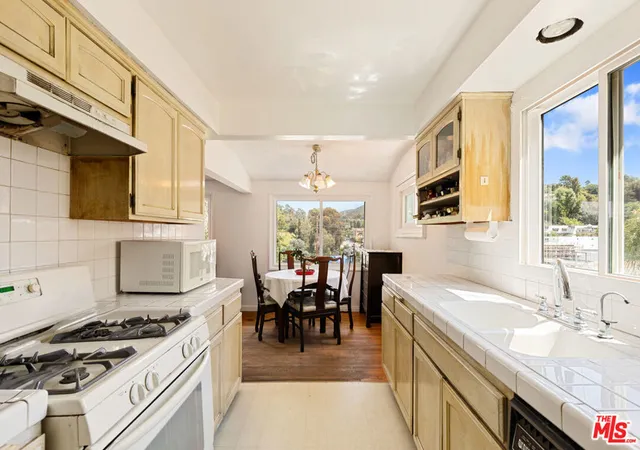 Photo 3 of Single family home for sale at 3242 Dos Palos Dr, Los Angeles, CA 90068 | MLS# 26701289 | Listing updated on 2026-04-18