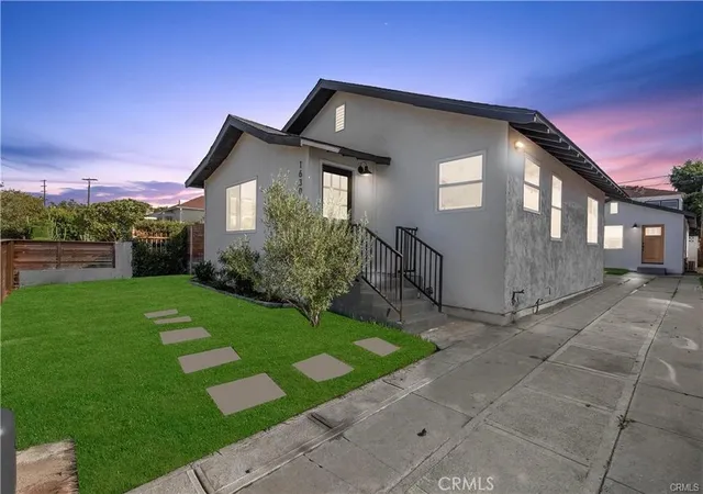 Photo 1 of Multi family home for sale at 1630 S Ridgeley, Los Angeles, CA 90019 | MLS# DW26081910 | Listing updated on 2026-04-17