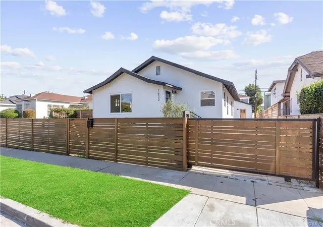 Photo 2 of Multi family home for sale at 1630 S Ridgeley, Los Angeles, CA 90019 | MLS# DW26081910 | Listing updated on 2026-04-17