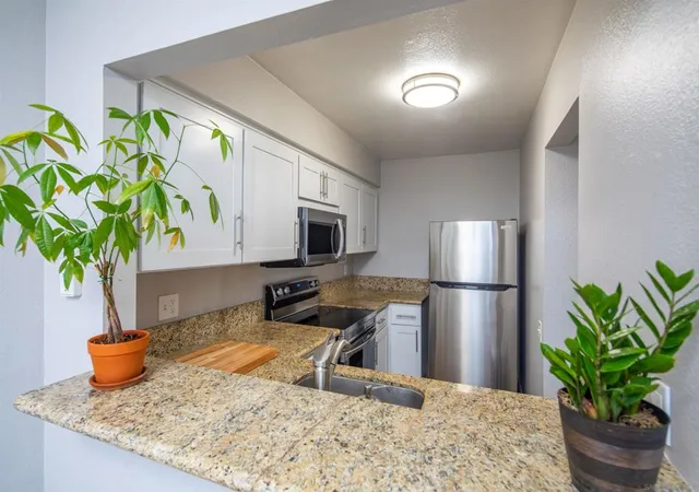 Listing Photo 4 - Condo for sale in building located at 8019 Caminito De Pizza, San Diego, CA 92108 - Unit #D