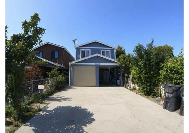 Photo 1 of Single family home for sale at 1243 East 100th, Los Angeles, CA 90002 | MLS# CV26091339 | Listing updated on 2026-10-01