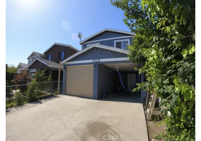 Photo 2 of Single family home for sale at 1243 East 100th, Los Angeles, CA 90002 | MLS# CV26091339 | Listing updated on 2026-10-01