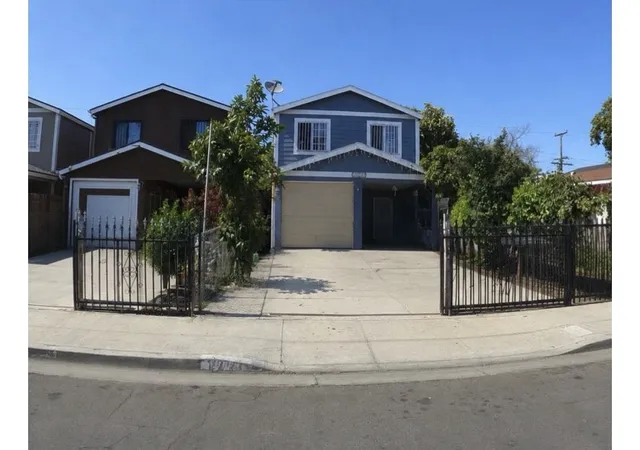 Photo 3 of Single family home for sale at 1243 East 100th, Los Angeles, CA 90002 | MLS# CV26091339 | Listing updated on 2026-10-01