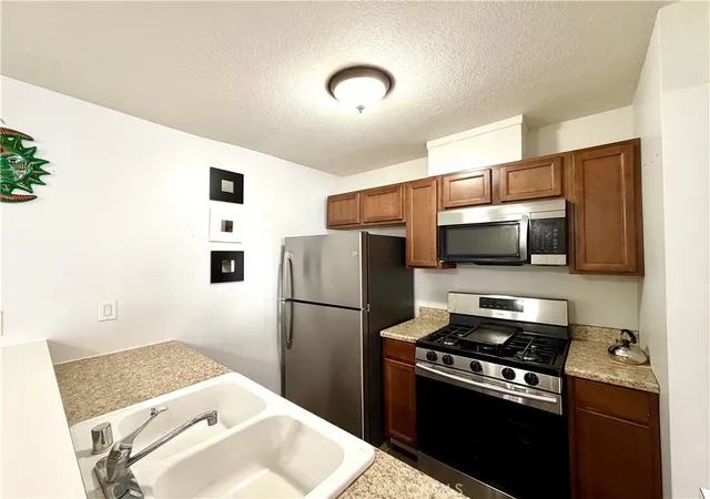 Photo 4 of Condo for sale at 8601 International #224, Canoga Park, CA 91304 | MLS# SR26096132 | Listing updated on 2026-09-17