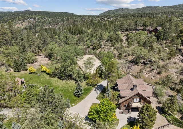 Photo 4 of Single family home for sale at 32310 Hummingbird Ct, Running Springs, CA 92382 | MLS# IG26101653 | Listing updated on 2026-09-11