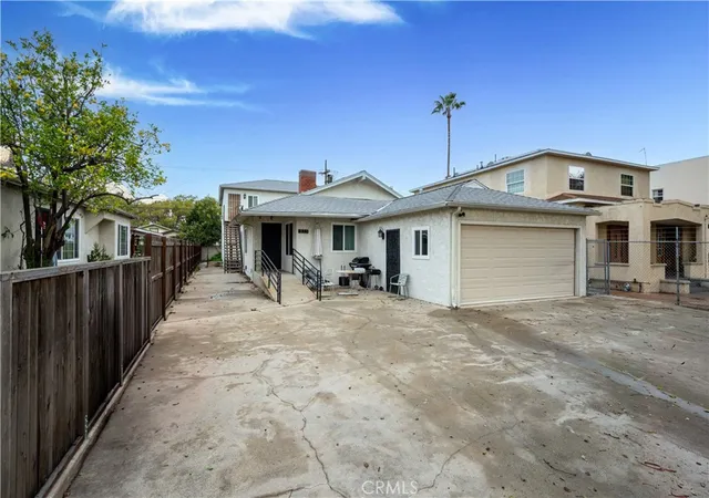 Single family home for sale at 833 W 41st Drive, Los Angeles, CA 90037 | MLS# SB26108815
