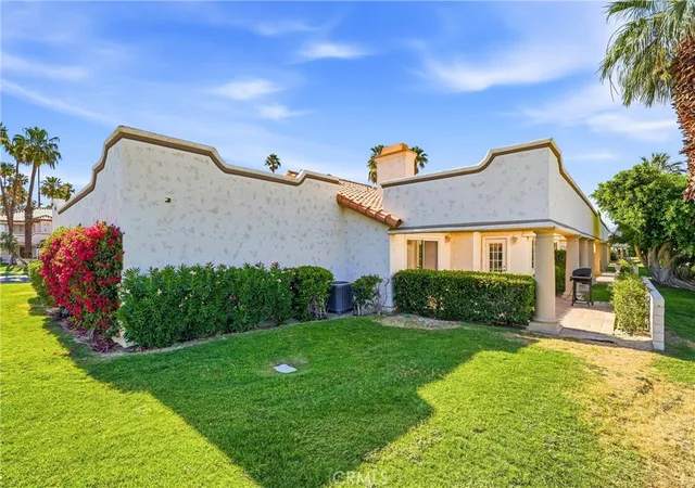 Listing Photo 1 - Condo for sale in building located at 128 Desert Fls Dr E, Palm Desert, CA 92211 - Unit #