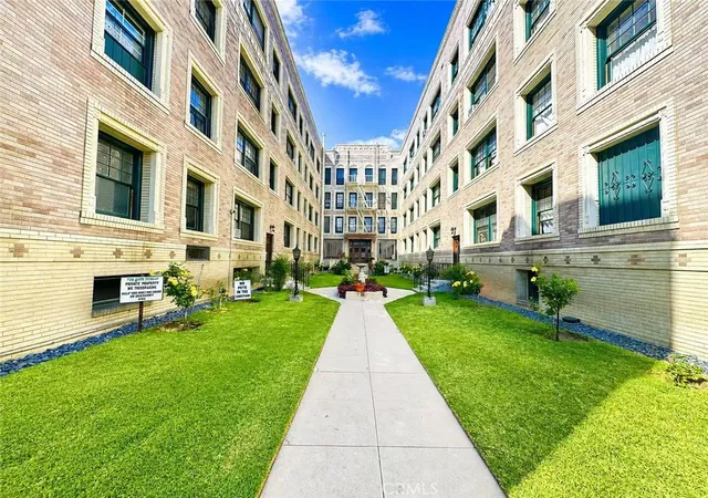 1st image of 2121 James M Wood Blvd #411, Los Angeles, CA 90006 | MLS# CV26115678
