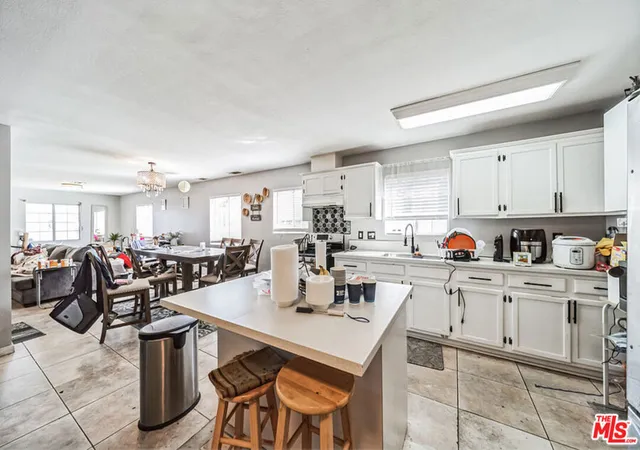 Photo 3 of Single family home for sale at 12221 Athens Way, Los Angeles, CA 90061 | MLS# 26840643 | Listing updated on 2026-09-09