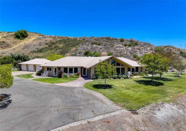 Photo 1 of Single family home for sale at 31233 Romero Cyn, Castaic, CA 91384 | MLS# SR26123534 | Listing updated on 2026-06-09
