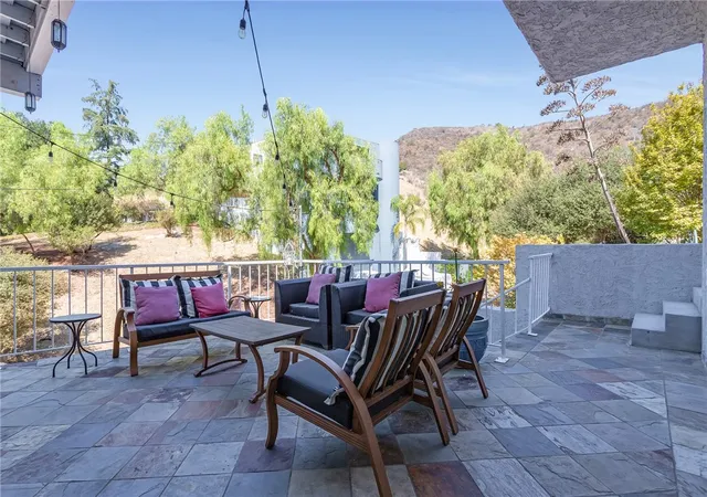 Photo 3 of Single family home for sale at 20906 Almazan Rd, Woodland Hills, CA 91364 | MLS# SB26123952 | Listing updated on 2026-06-09