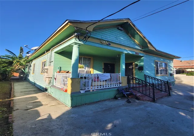 Photo 1 of Multi family home for sale at 1757 S New England, Los Angeles, CA 90006 | MLS# DW26125775 | Listing updated on 2026-06-10