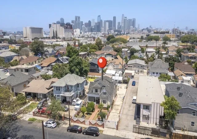 Photo 2 of Single family home for sale at 221 East 25th, Los Angeles, CA 90011 | MLS# DW26126326 | Listing updated on 2026-10-04