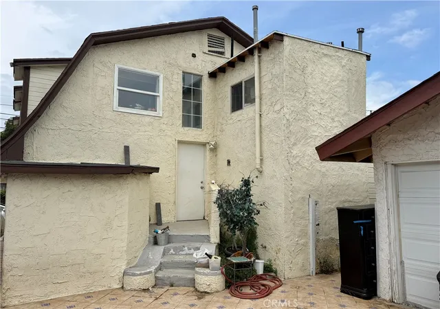 Photo 3 of Multi family home for sale at 3914 Wisconsin Pl, Los Angeles, CA 90037 | MLS# DW26128343 | Listing updated on 2026-06-18