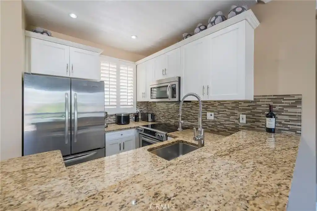 Listing Photo 1 - Condo for sale in 20251 Cape Coral Ln located at 20251 Cape Coral Ln, Huntington Beach, CA 92646 - Unit #202
