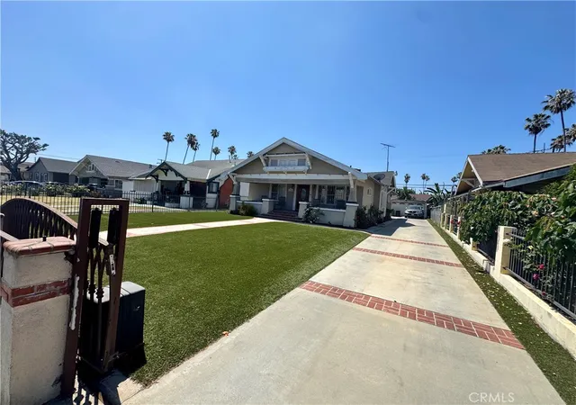 Photo 2 of Single family home for sale at 1758 W 51st Street, Los Angeles, CA 90062 | MLS# OC26130882 | Listing updated on 2026-09-23
