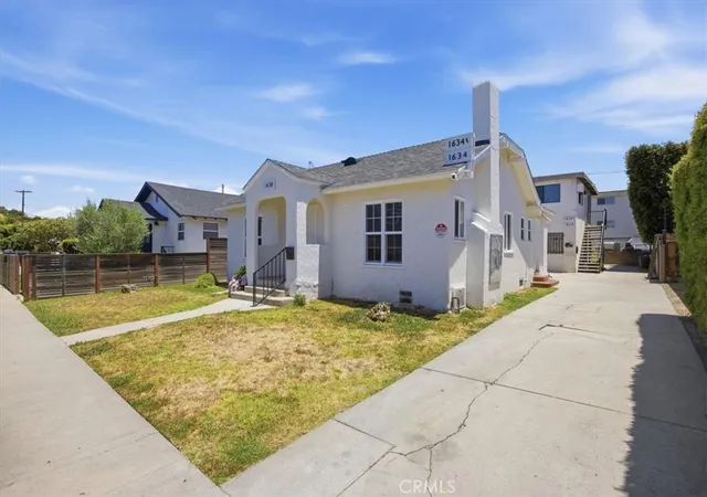 Photo 3 of Multi family home for sale at 1636 S Ridgeley, Los Angeles, CA 90019 | MLS# SW26131788 | Listing updated on 2026-10-01