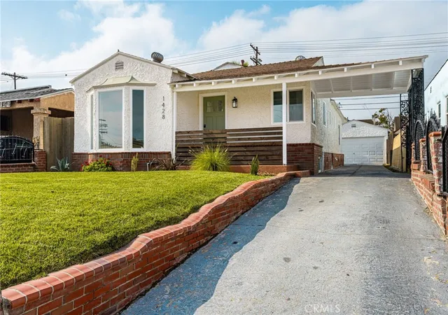 Photo 2 of Single family home for sale at 1428 W 89th Street, Los Angeles, CA 90047 | MLS# DW26126590 | Listing updated on 2026-09-13