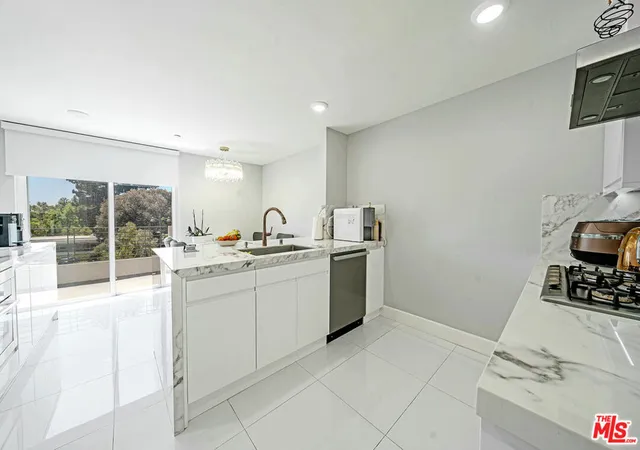 Photo 3 of Condo for sale at 4925 Wilshire Blvd #302, Los Angeles, CA 90010 | MLS# 26848035 | Listing updated on 2026-06-30