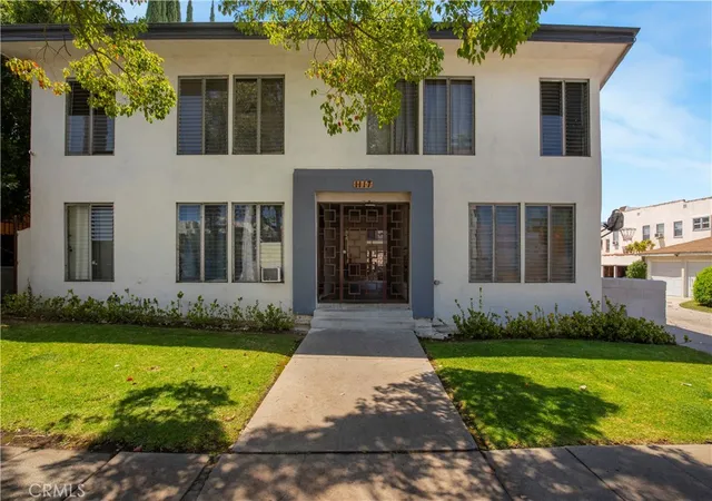Photo 1 of Multi family home for sale at 1117 S Spaulding, Los Angeles, CA 90019 | MLS# SB26130250 | Listing updated on 2026-09-22