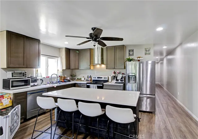 Photo 3 of Multi family home for sale at 5420 Manhattan Pl, Los Angeles, CA 90062 | MLS# MB26136328 | Listing updated on 2026-06-24
