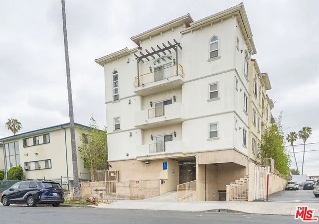 Listing Photo 1 - Condo for sale in Mariposa Courtyard located at 309 S Mariposa Ave, Los Angeles, CA 90020 - Unit #301