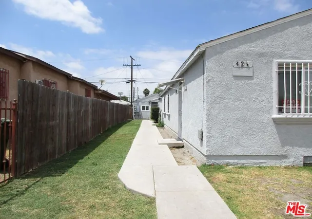 Photo 3 of Multi family home for sale at 427 E 98th Street, Los Angeles, CA 90003 | MLS# 26852643 | Listing updated on 2026-09-29