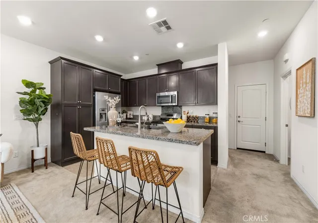 Photo 3 of Condo for sale at 7100 Montecito Ln, Eastvale, CA 92880 | MLS# OC26139011 | Listing updated on 2026-09-29
