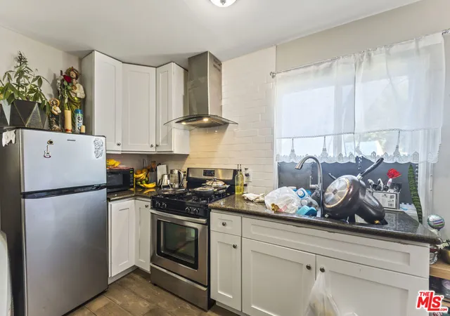 Photo 3 of Multi family home for sale at 901 E 42nd Street, Los Angeles, CA 90011 | MLS# 26853587 | Listing updated on 2026-09-08