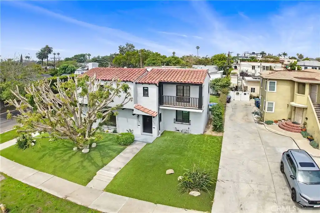 Photo 1 of Multi family home for sale at 1567 S Spaulding, Los Angeles, CA 90019 | MLS# DW26141500 | Listing updated on 2026-10-10