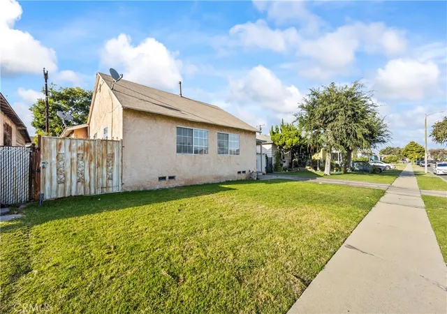 Photo 2 of Single family home for sale at 1209 E 124th Street, Los Angeles, CA 90059 | MLS# OC26143049 | Listing updated on 2026-09-23
