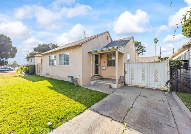 Photo 3 of Single family home for sale at 1209 E 124th Street, Los Angeles, CA 90059 | MLS# OC26143049 | Listing updated on 2026-09-23