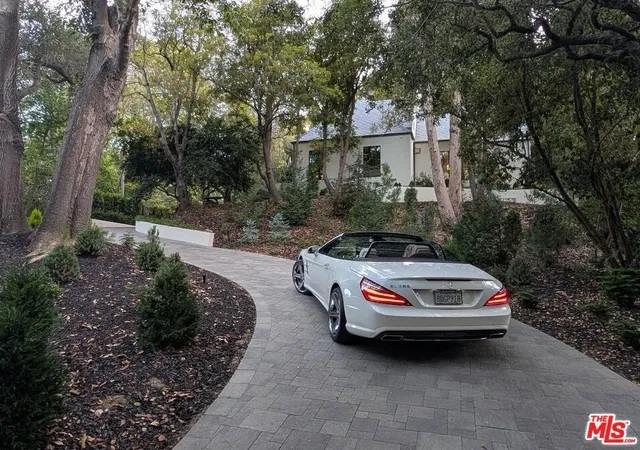 Photo 1 of Single family home for sale at 943 Moraga Dr, Los Angeles, CA 90049 | MLS# 26857753 | Listing updated on 2026-10-08