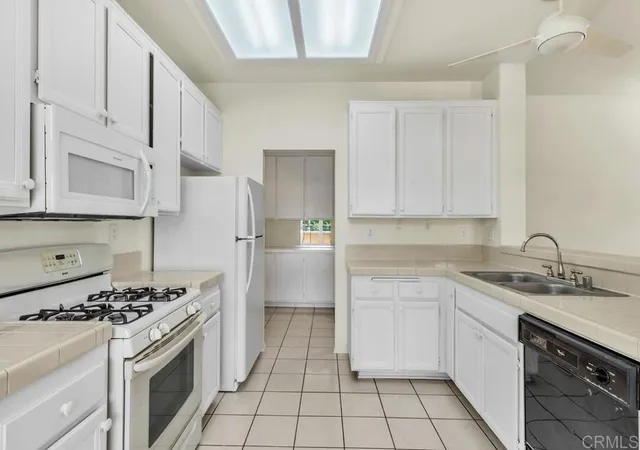 Listing Photo 4 - Condo for sale in building located at 11154 Portobelo Dr, San Diego, CA 92124