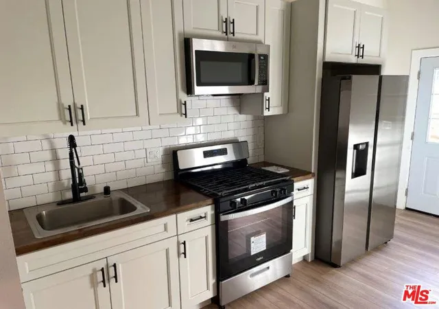 Photo 3 of Multi family home for sale at 9712 S San Pedro St, Los Angeles, CA 90003 | MLS# 26858683 | Listing updated on 2026-09-11