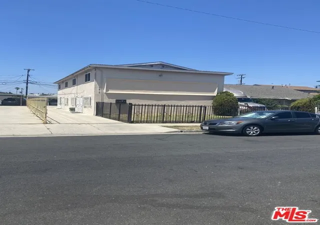 Photo 1 of Multi family home for sale at 1215 W 102nd Street, Los Angeles, CA 90044 | MLS# 26857901 | Listing updated on 2026-09-10