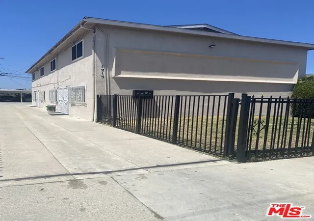 Photo 2 of Multi family home for sale at 1215 W 102nd Street, Los Angeles, CA 90044 | MLS# 26857901 | Listing updated on 2026-09-10