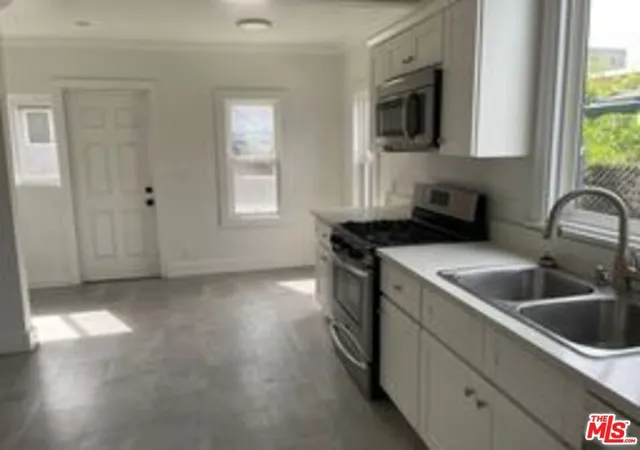 Photo 3 of Multi family home for sale at 817 N Harvard Blvd, Los Angeles, CA 90029 | MLS# 26857857 | Listing updated on 2026-10-05