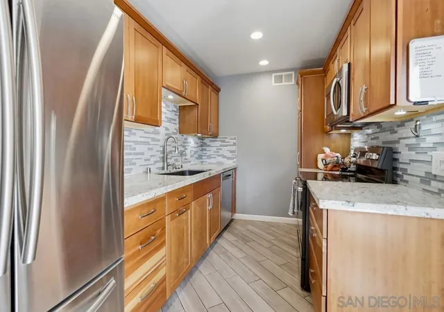 Listing Photo 4 - Condo for sale in building located at 6416 Friars Rd, San Diego, CA 92108 - Unit #111