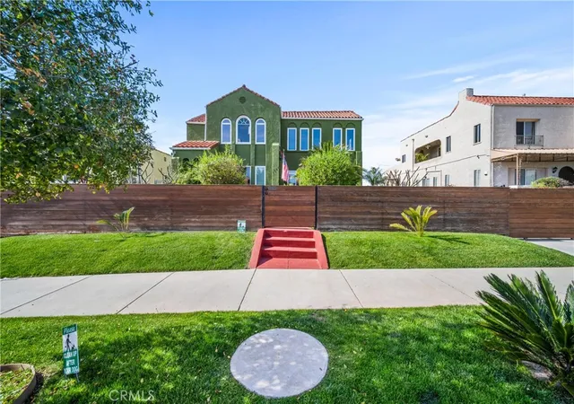 Photo 1 of Multi family home for sale at 1245 S Hudson Ave, Los Angeles, CA 90019 | MLS# SR26154953 | Listing updated on 2026-10-06