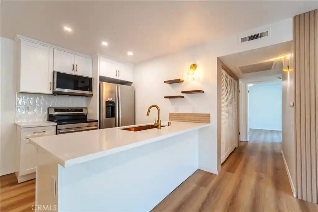 Photo 1 of Condo for sale at 21951 Rimhurst Dr #202, Lake Forest, CA 92630 | MLS# OC26154161 | Listing updated on 2026-10-11