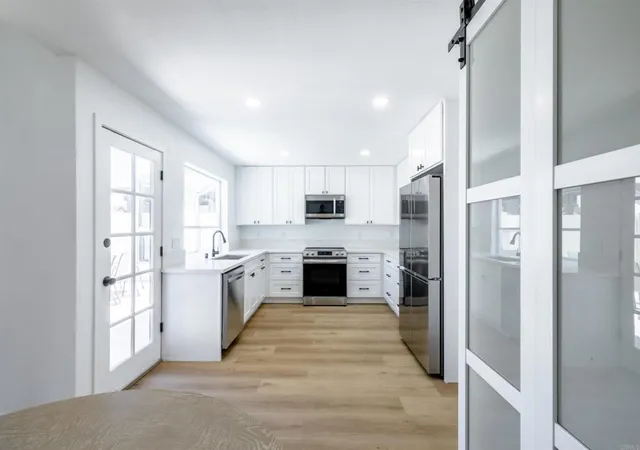 Listing Photo 2 - Condo for sale in building located at 6987 Parkside Ave, San Diego, CA 92139 - Unit #C