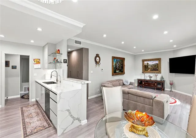 Photo 1 of Condo for sale at 14607 Erwin St #107, Van Nuys, CA 91411 | MLS# SR26152296 | Listing updated on 2026-09-29