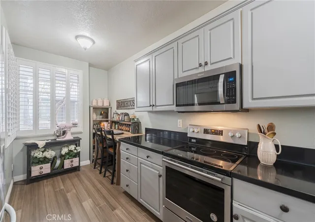 Listing Photo 4 - Condo for sale in building located at 20331 Bluffside Cir, Huntington Beach, CA 92646