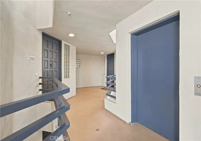 Listing Photo 3 - Condo for sale in building located at 4167 Warner, Huntington Beach, CA 92649 - Unit #205