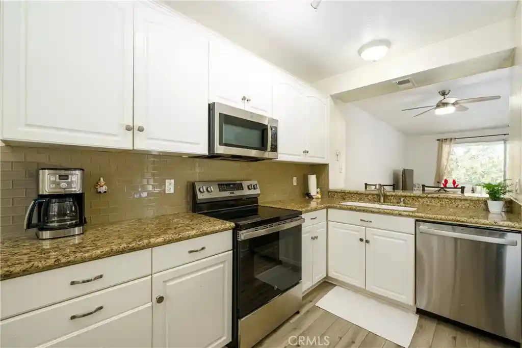 Photo 1 of Condo for sale at 20301 Bluffside Cir #211, Huntington Beach, CA 92646 | MLS# OC26162269 | Listing updated on 2026-10-28